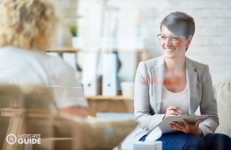 psychologist talking to a patient in her office