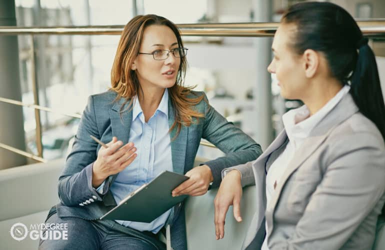 human resource manager talking to an employee