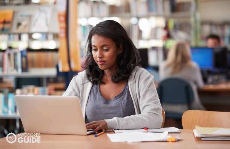 phd in psychology student in university library