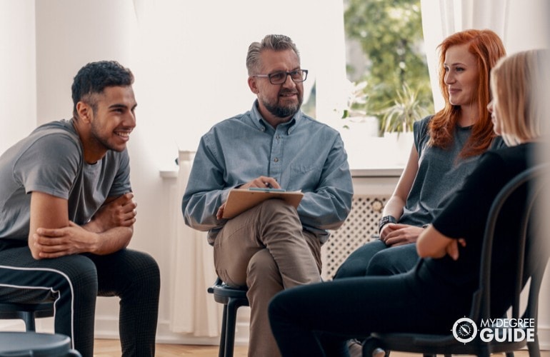 psychologist and patients during group therapy