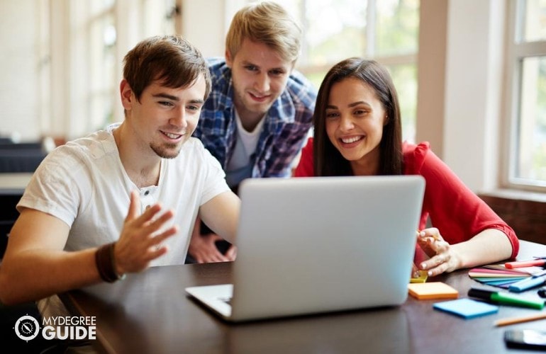 Public Administration students studying together in university library