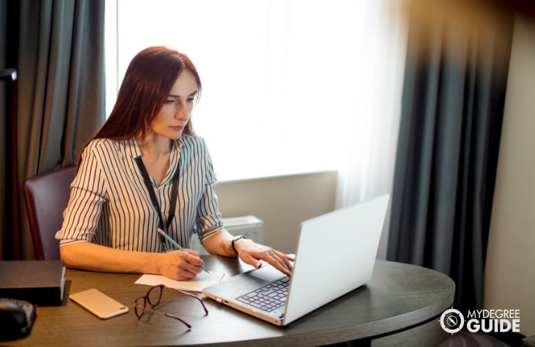 Public Administrator working on her laptop