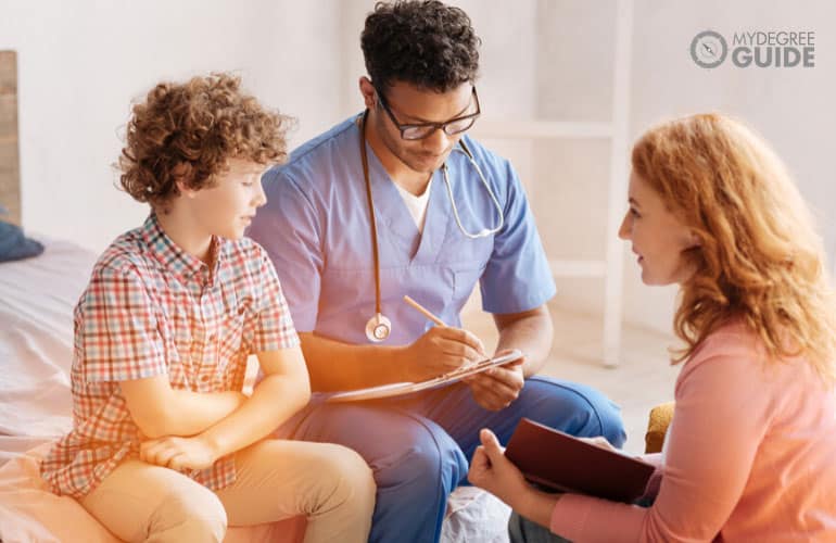 phd students interviewing a patient