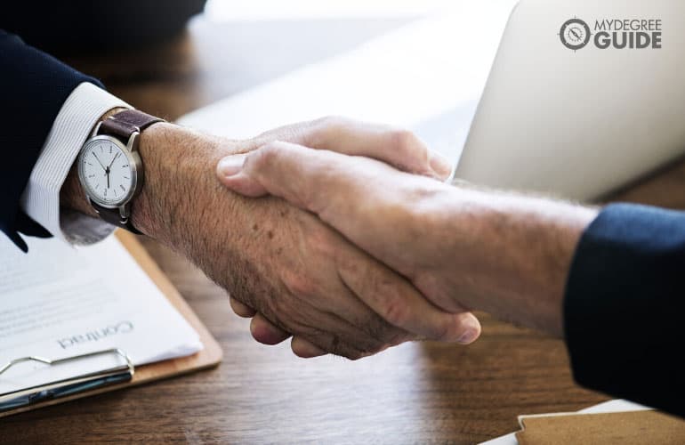 men handshake after an agreement