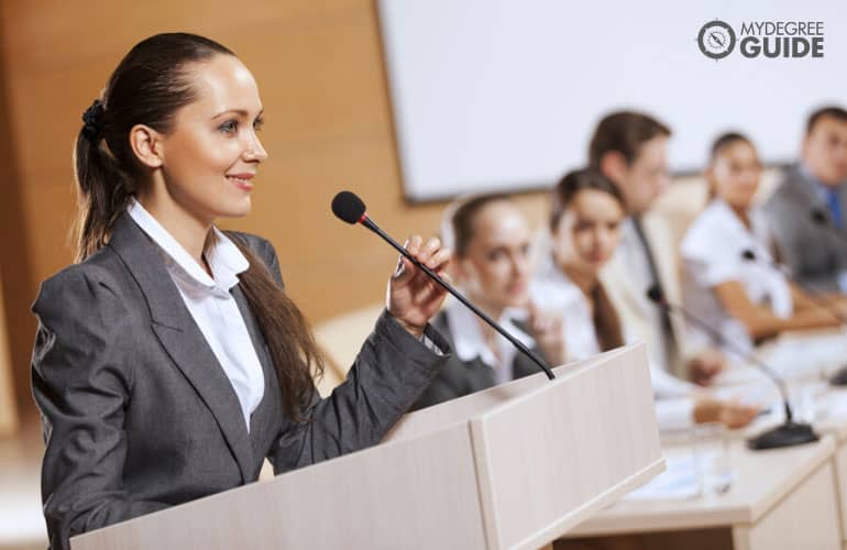 Public relations officer talking during a meeting