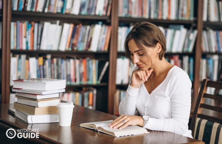 Adult Bachelor Degree student studying in library