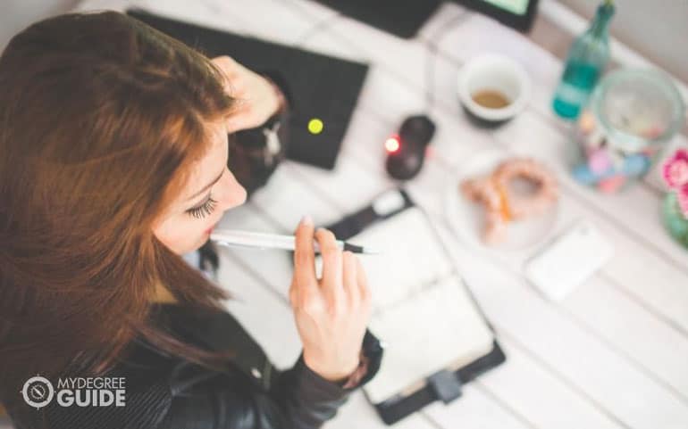 Woman reading application for financial aid