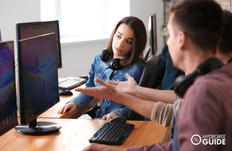 computer programmers working together on a project