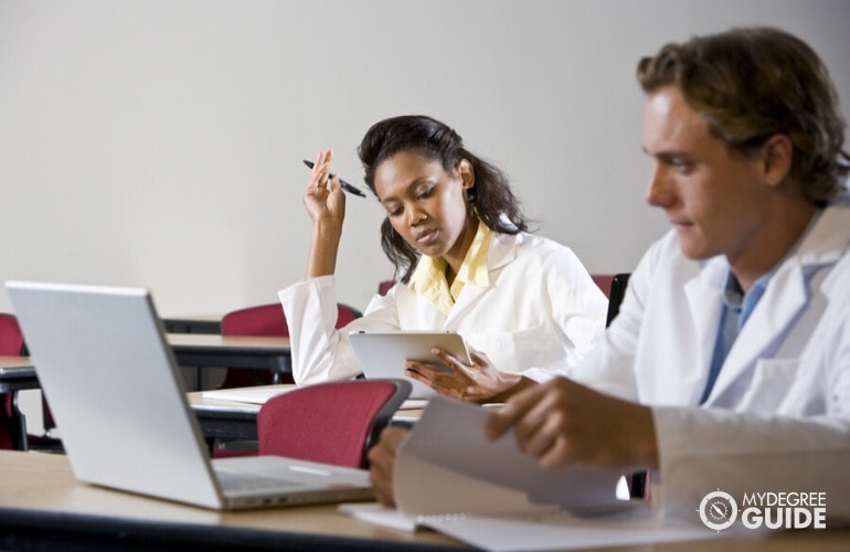 Health Information Technology students studying in class