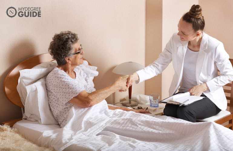 social worker visiting a senior woman in her home