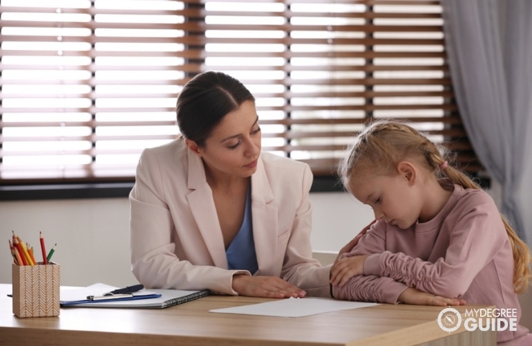 social worker comforting a child