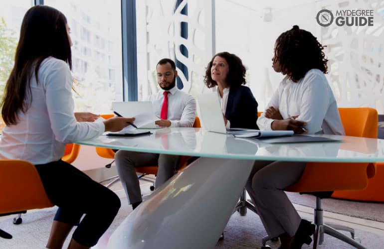 human resource persons talking in an office