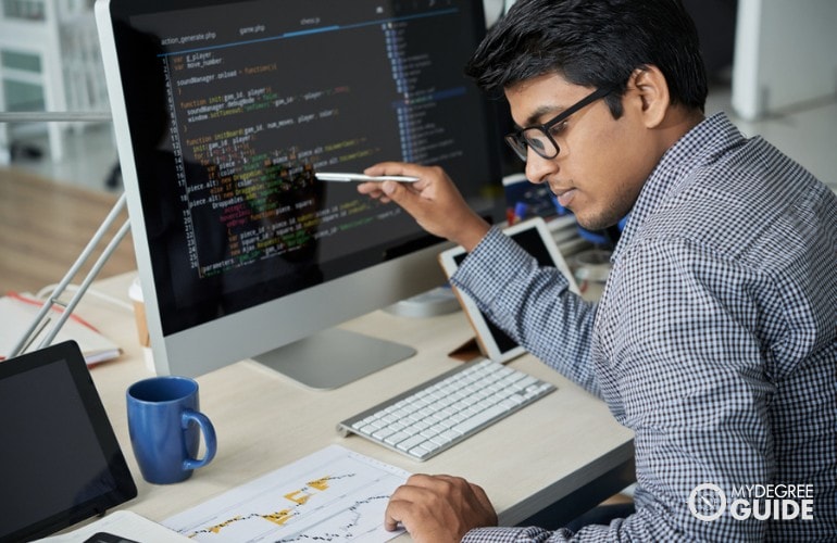 software engineer working on her computer