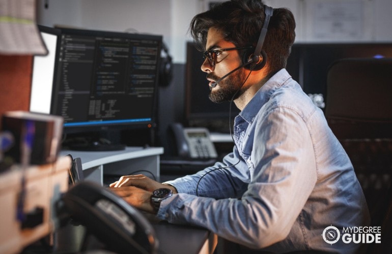 software engineer working overtime in the office