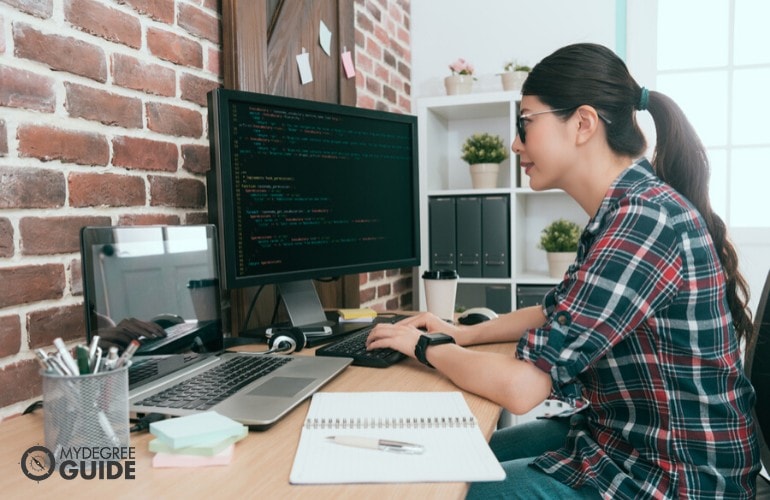 software engineer working on her computer