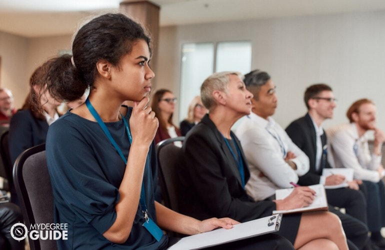 sports managers attending a conference