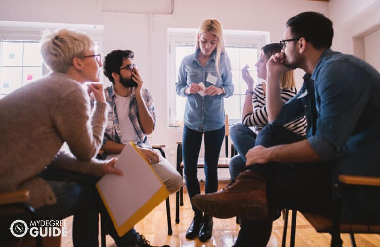 woman sharing her problems during a group therapy session