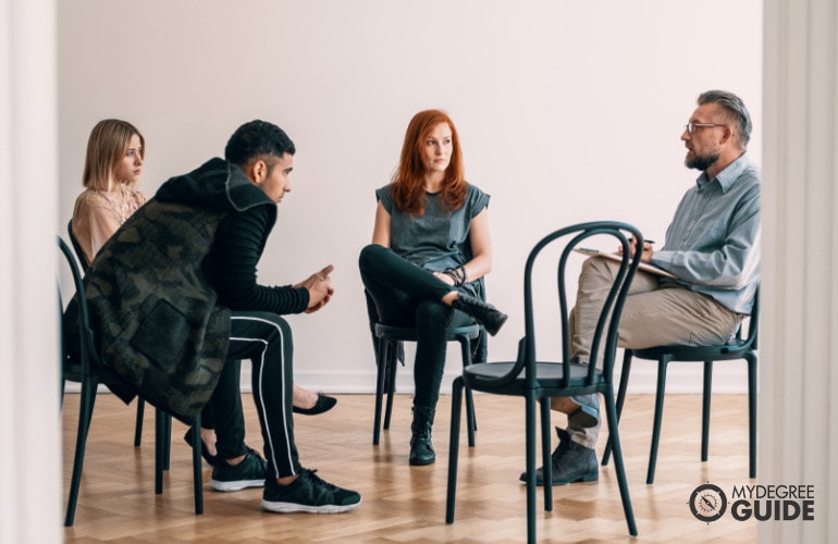 female addiction counselor entering her office