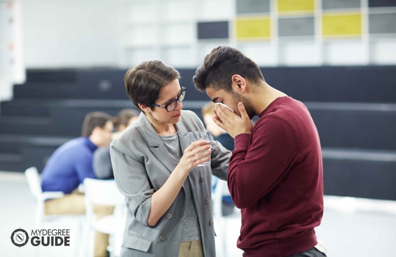 social worker comforting a male patient