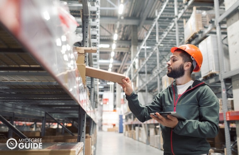 warehouse director checking the inventory