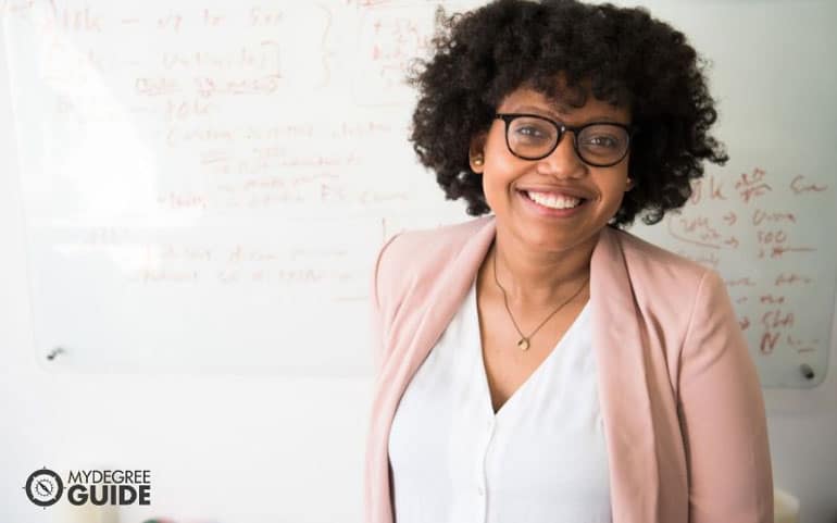 young teacher at whiteboard