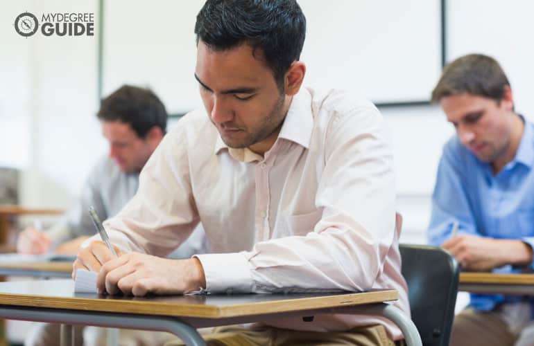 male adults taking an exam