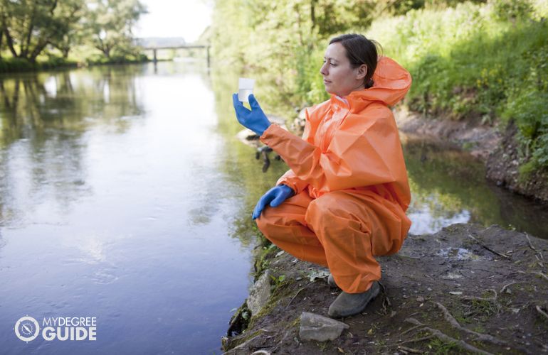 Water Chemist collecting ground water sample 