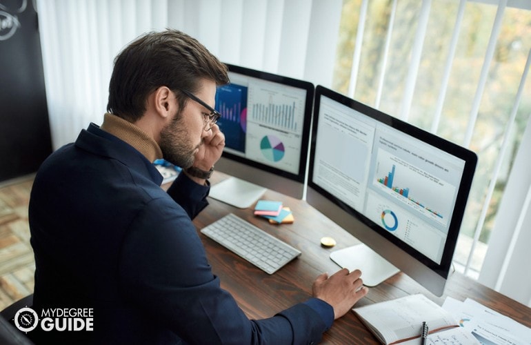 Statistician working in his office