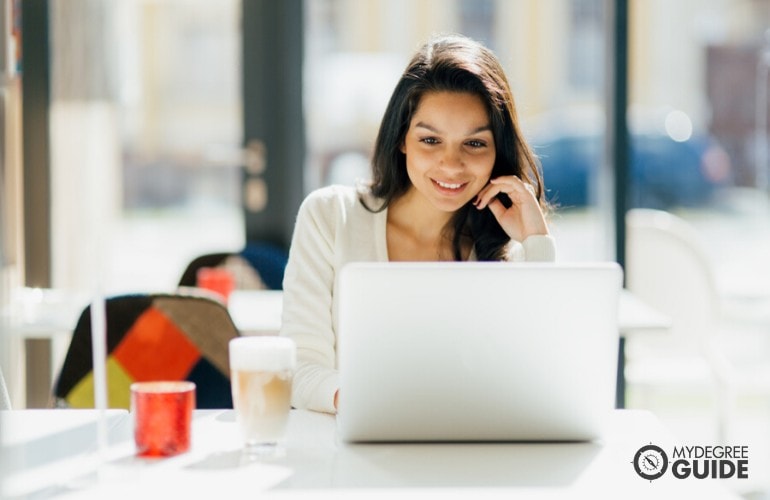 Bachelor's degree student studying at a cafe