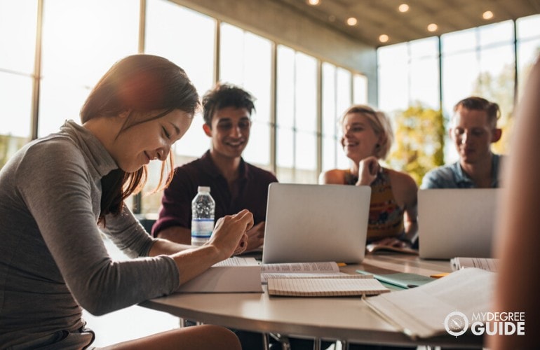 college students studying together in library