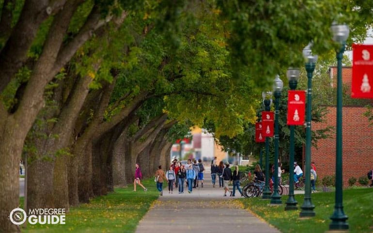 Women students walking on college campus